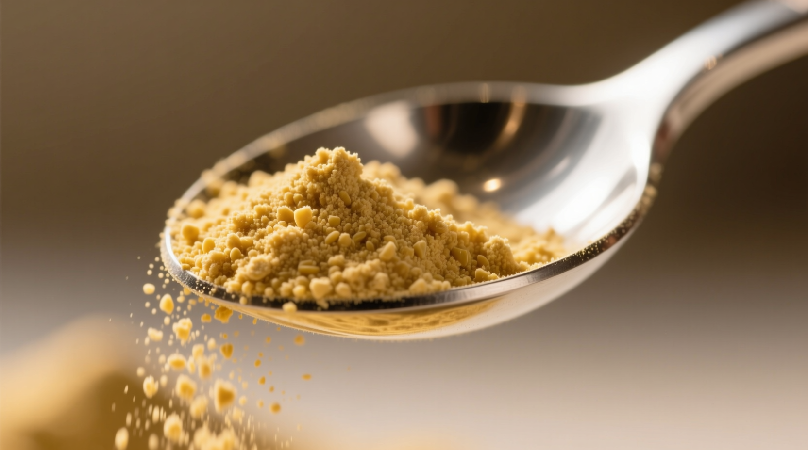 Close-up of yeast nutrient powder in measuring spoon