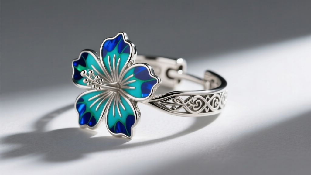 Side view of sterling silver hibiscus ear cuffs with turquoise inlay, showing intricate metalwork and a secure clasp mechanism.
