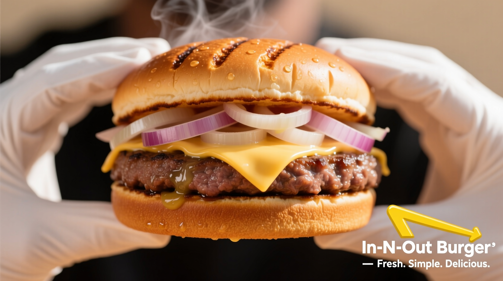 In-N-Out Cheeseburger with fresh raw onions on toasted bun