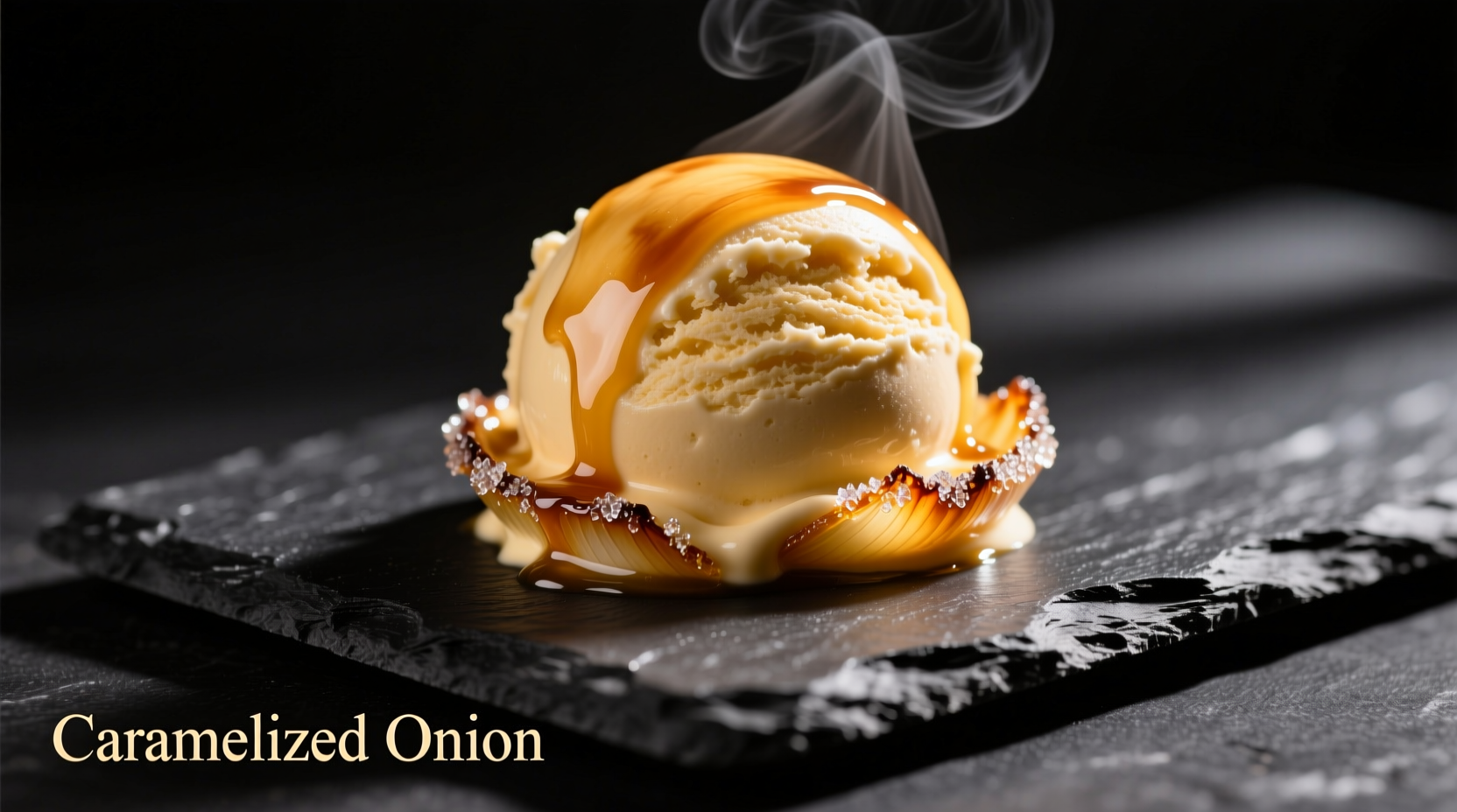 Golden caramelized onion ice cream scoop on black slate
