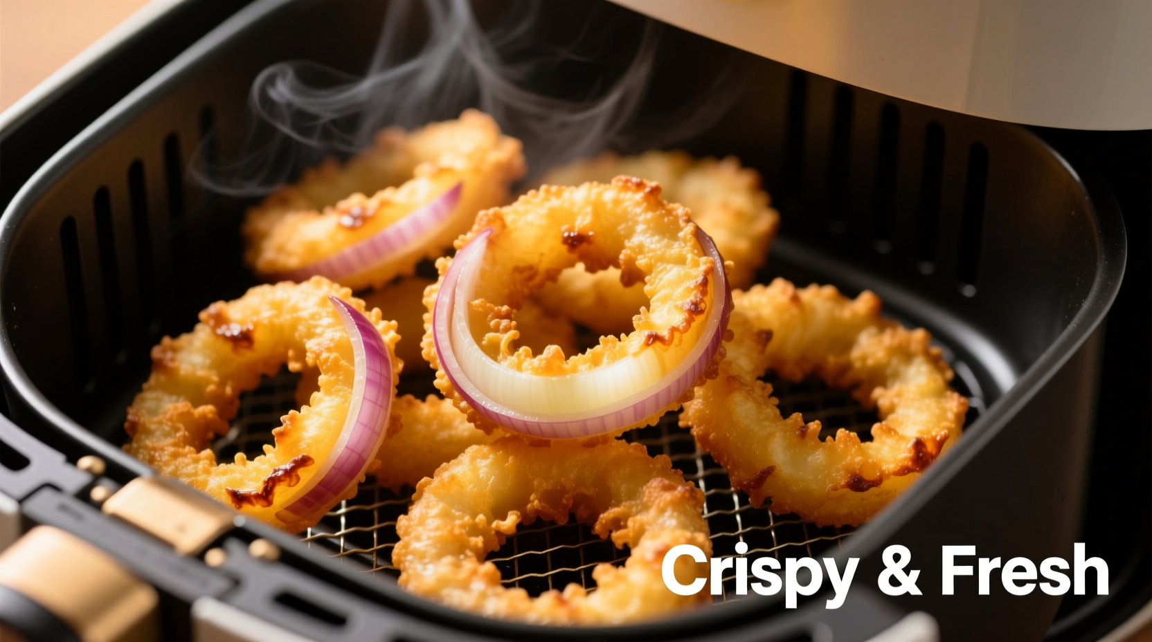 Golden crispy homemade onion rings in air fryer basket