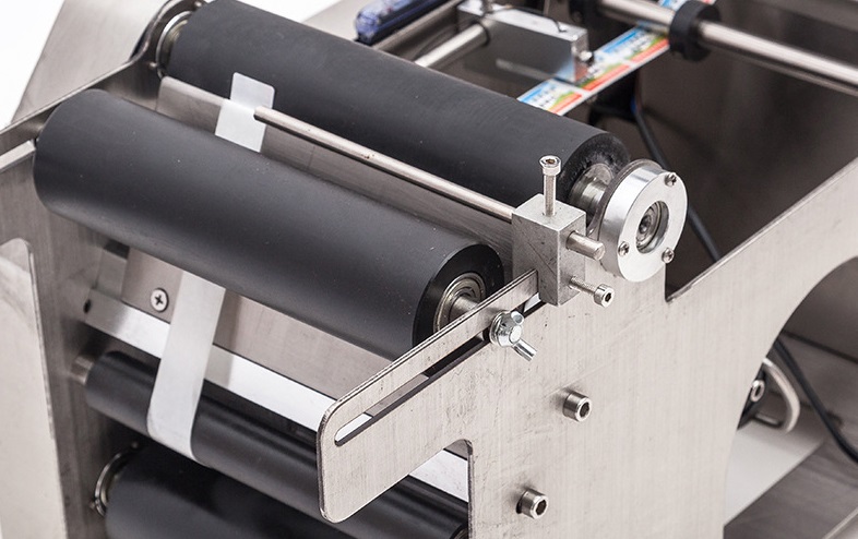 图片关键词 Hand Held Manual Round Bottle Labeling Machine With Printing Code,Manual Bottle Labeler