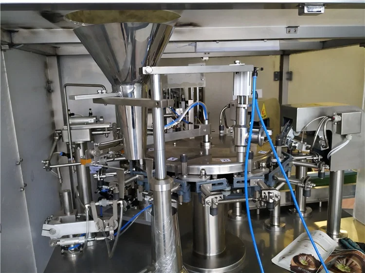 Automatic pouch packing machine for filling granule meat and sauce separately with elevator and paste filler