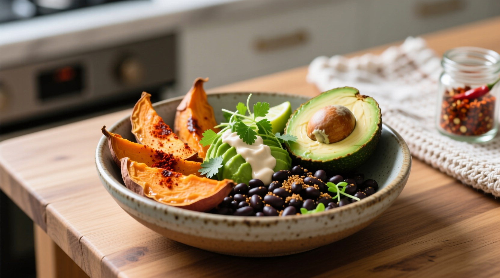 Vegan sweet potato black bean bowl with avocado