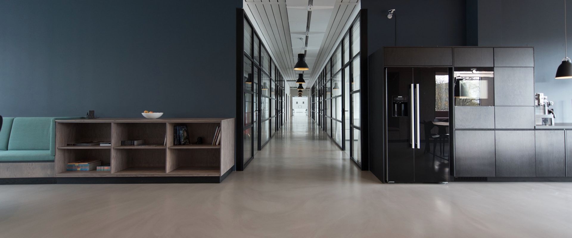 Modern open-plan office with natural light and collaborative workspace
