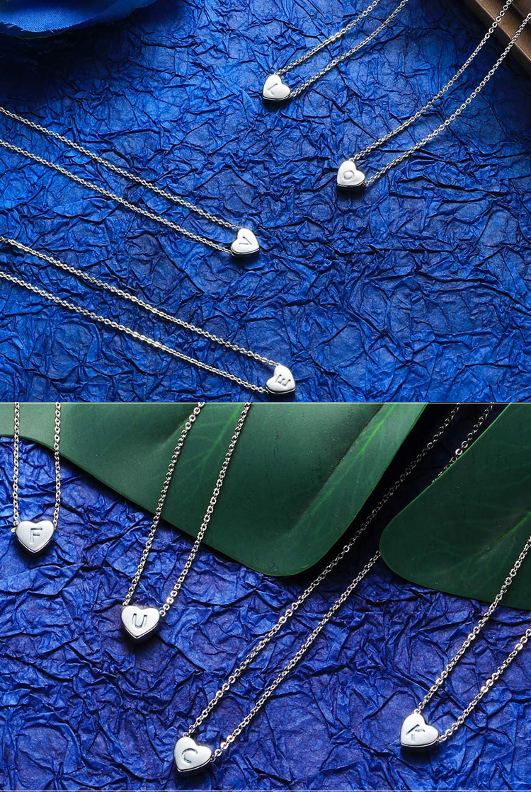 Wholesale mujeres joyería de acero inoxidable pequeño 18k 14k chapado en oro niños del alfabeto delicado del encanto de la letra inicial de encargo del collar del corazón