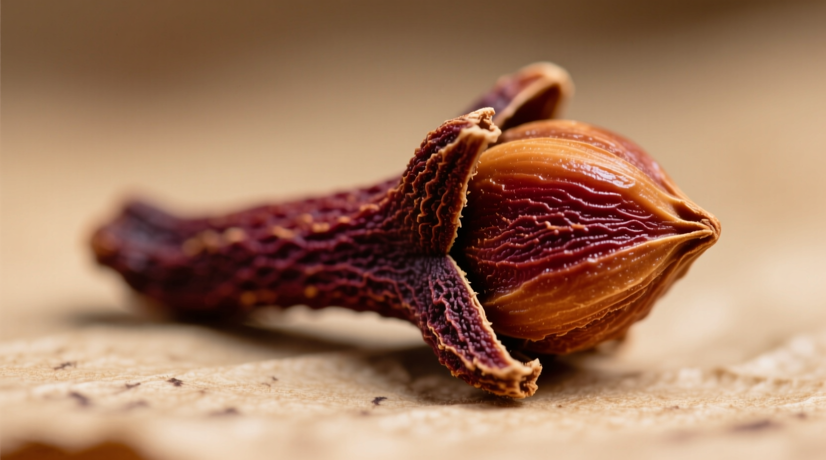 Close-up of whole cloves showing nail-like shape and reddish-brown color