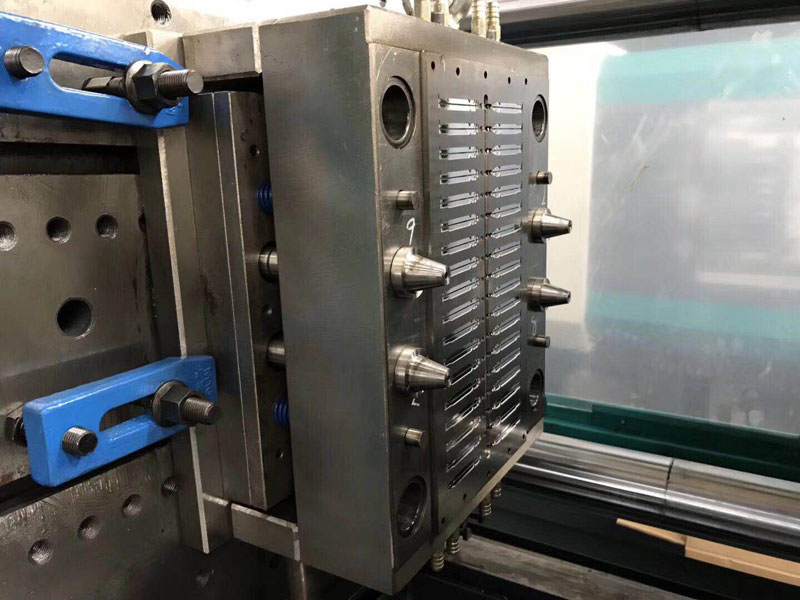 Disposable syringe making machine