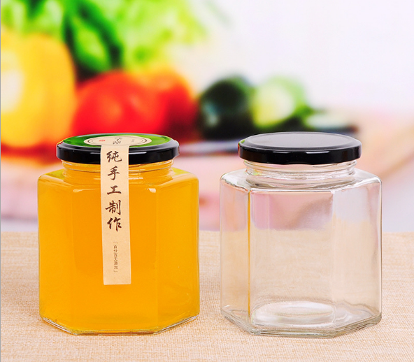 Hot selling wholesale different sizes hexagon shape honey glass jar