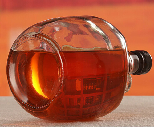 Wholesale Big beer wine glass bottle with handle