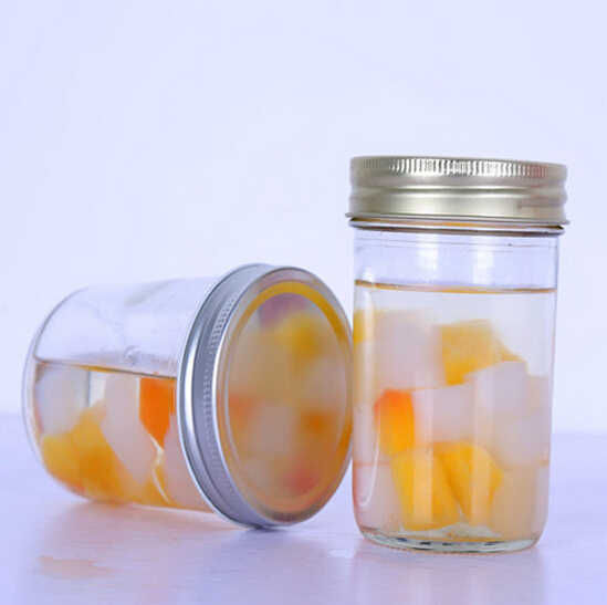 Sales of various models and sizes beehive wide mouth glass honey bottles with plastic cap honey glass jar