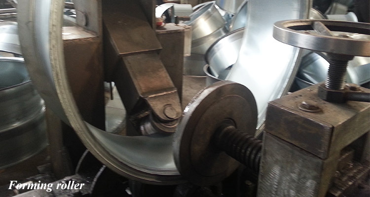 BOBO Machine blower crust vertical fan round flange roll forming shown in a detail photo for this news article