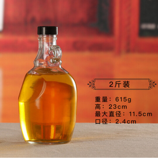 Wholesale Big beer wine glass bottle with handle