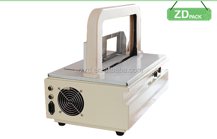 table mini strapping machinery,airport luggage packaging wrapping machine