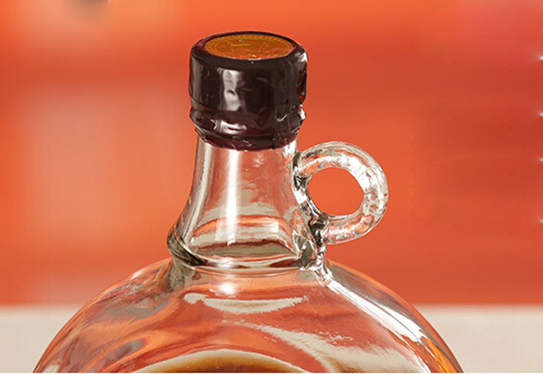 Wholesale Big beer wine glass bottle with handle