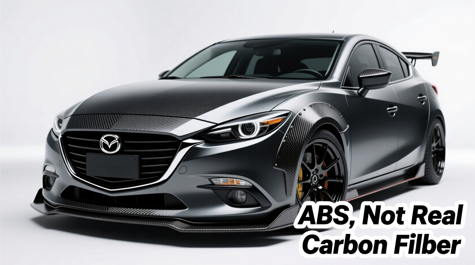 carbon vs abs mazda3 trim