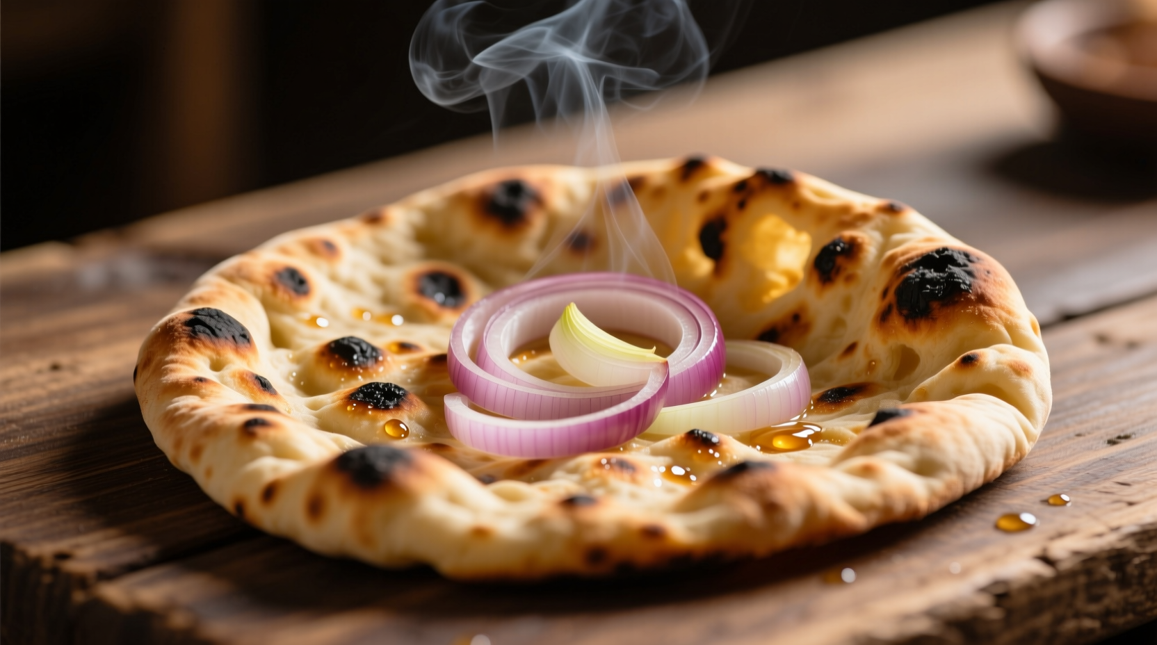 Freshly made onion naan with charred spots