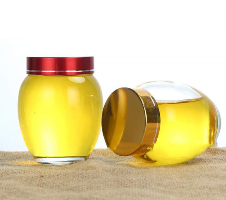 400毫升 500毫升 1000毫升厘米透明玻璃蜜罐里的黄颜色的塑料盖