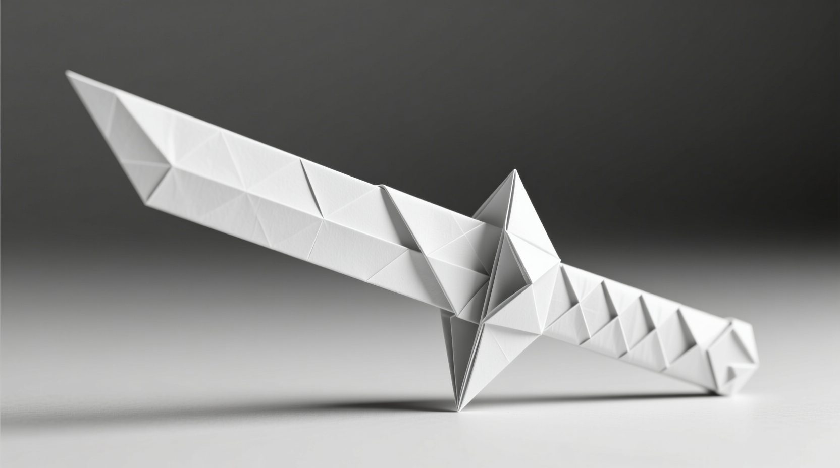 Completed paper kunai showing symmetrical sharp edges and balanced weight