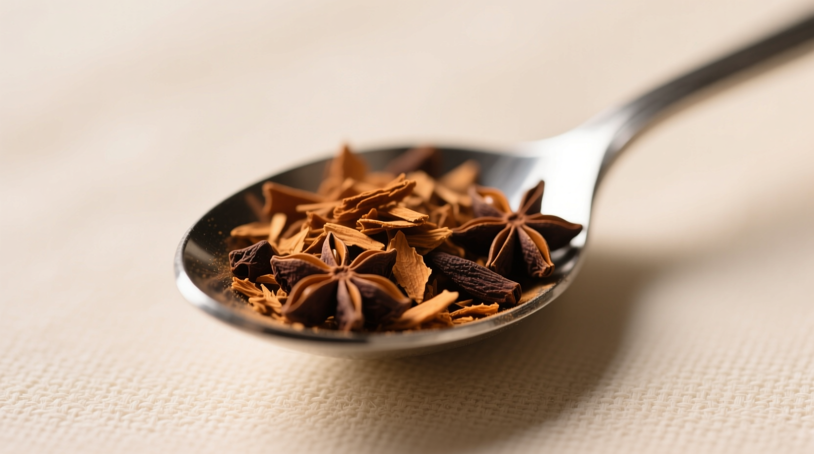 Homemade cinnamon-clove blend measured in a teaspoon for nutmeg substitution