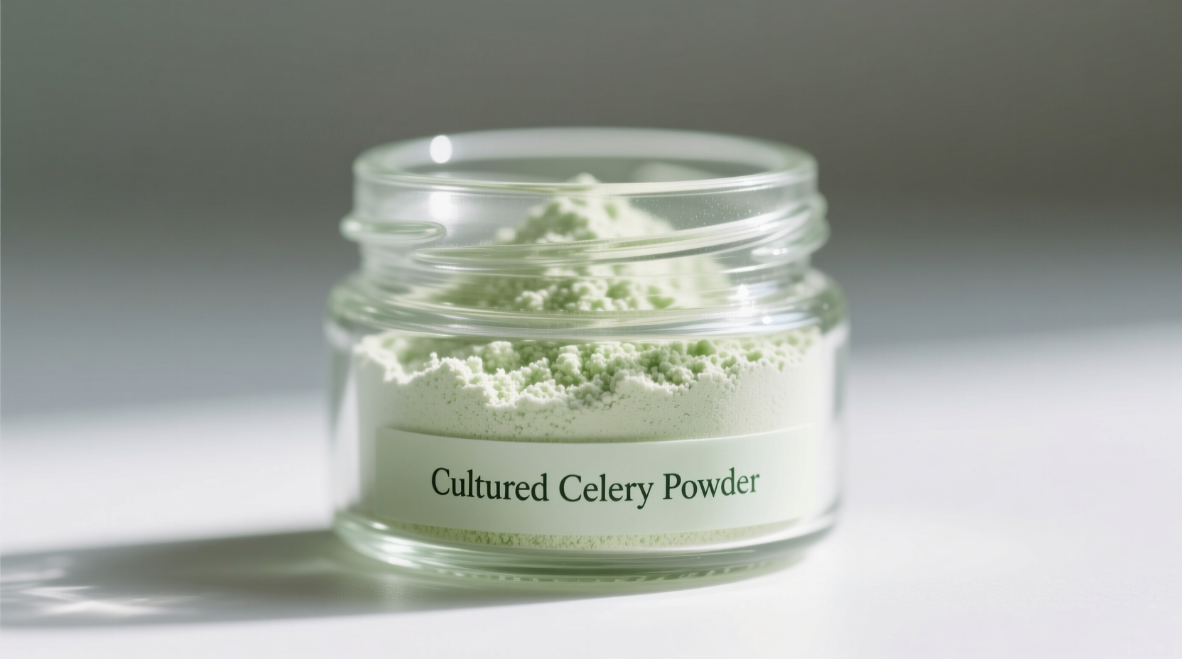 Close-up of cultured celery powder in glass container