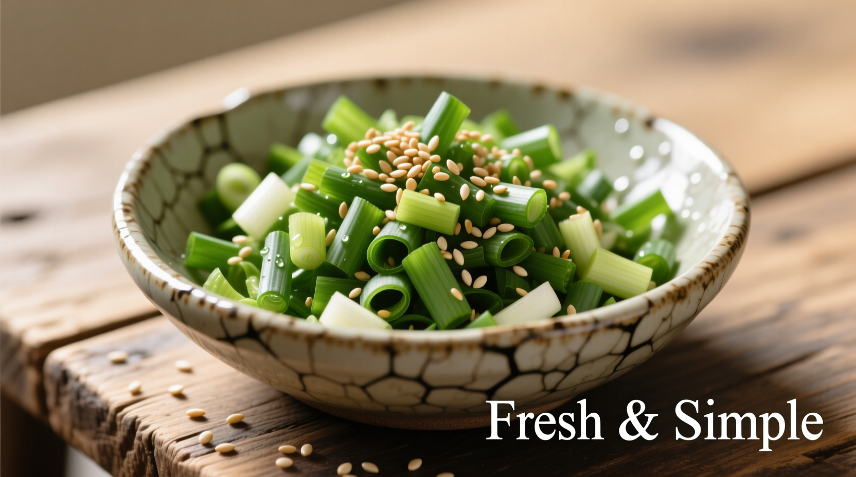 Fresh green onion salad in ceramic bowl with sesame seeds
