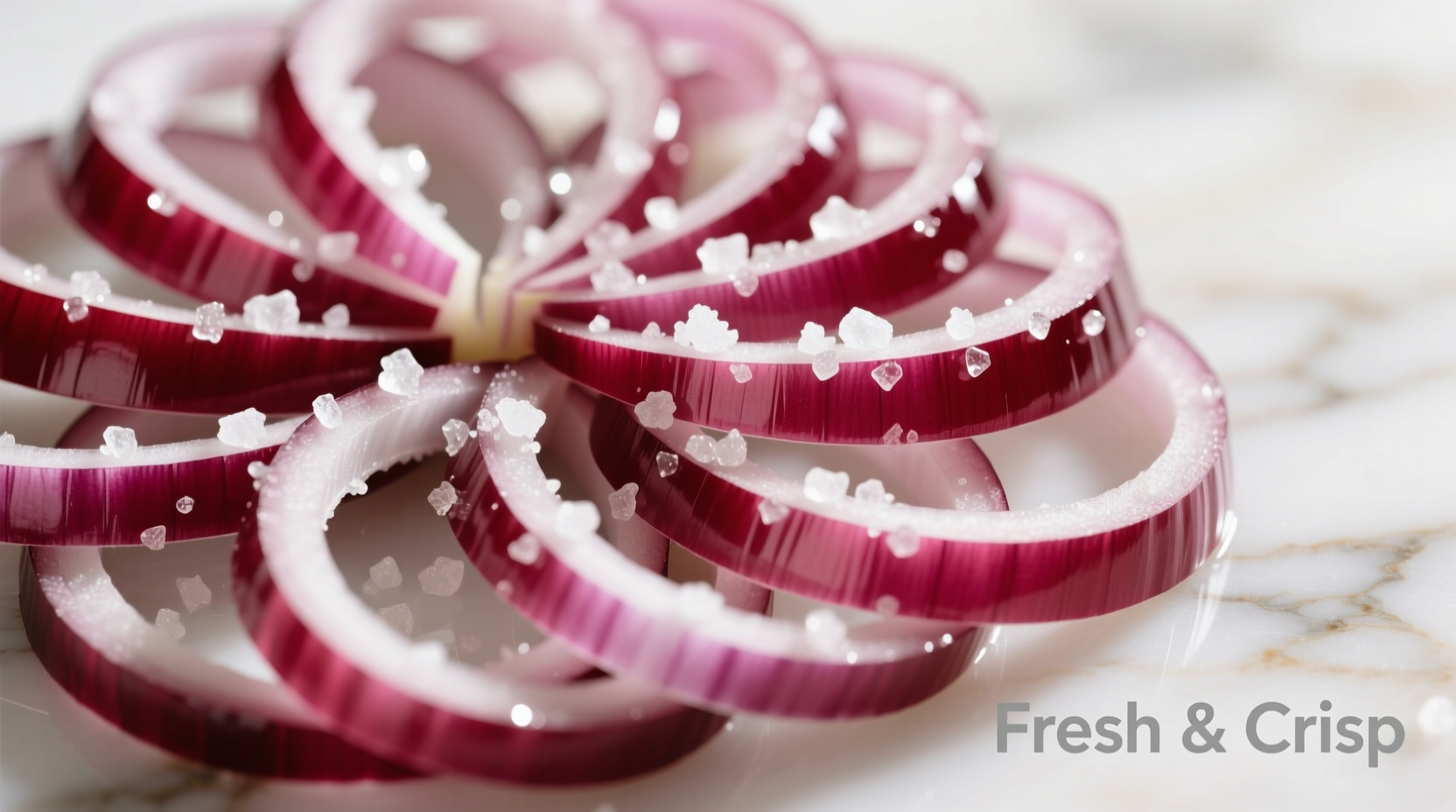 Freshly sliced red onions with sea salt crystals