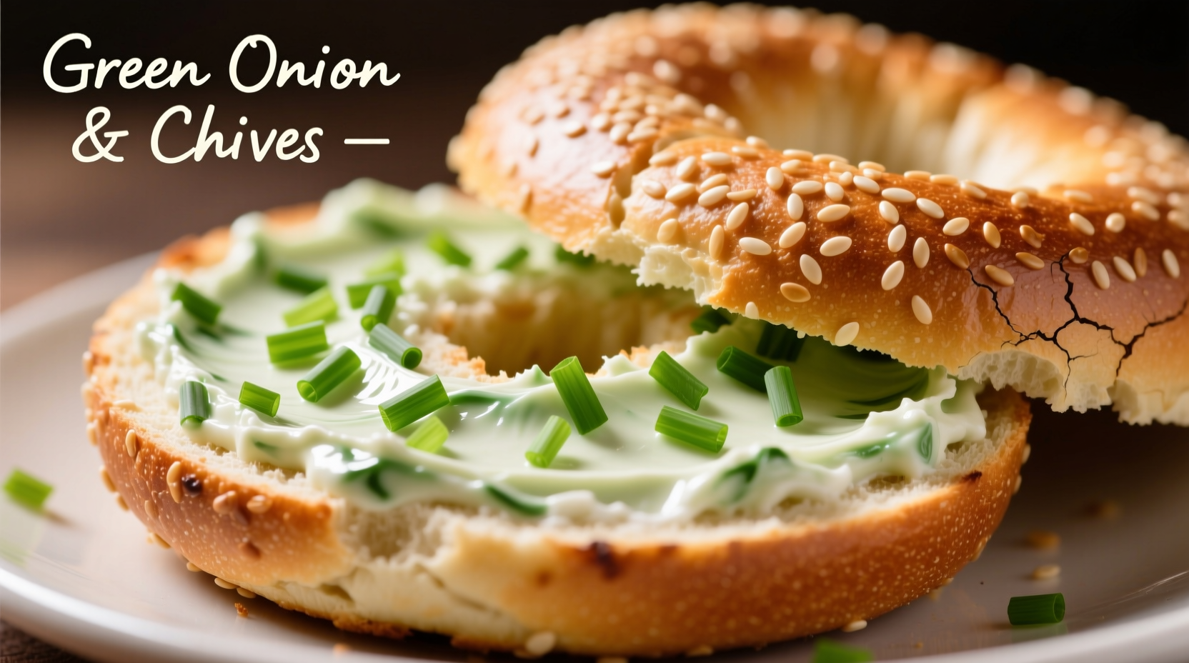 Green onion cream cheese spread on bagel with fresh chives
