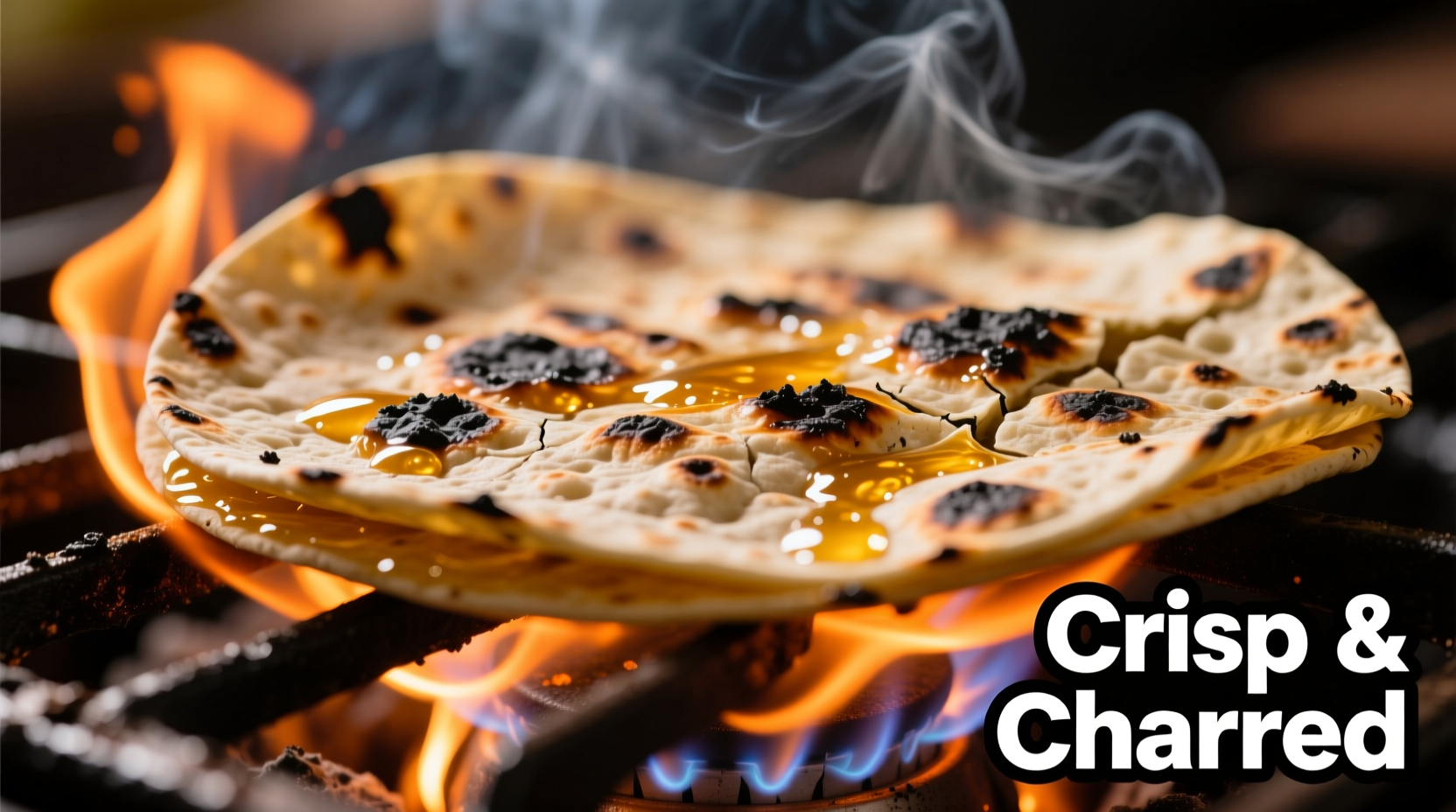 Close-up of charred corn tortillas on gas flame