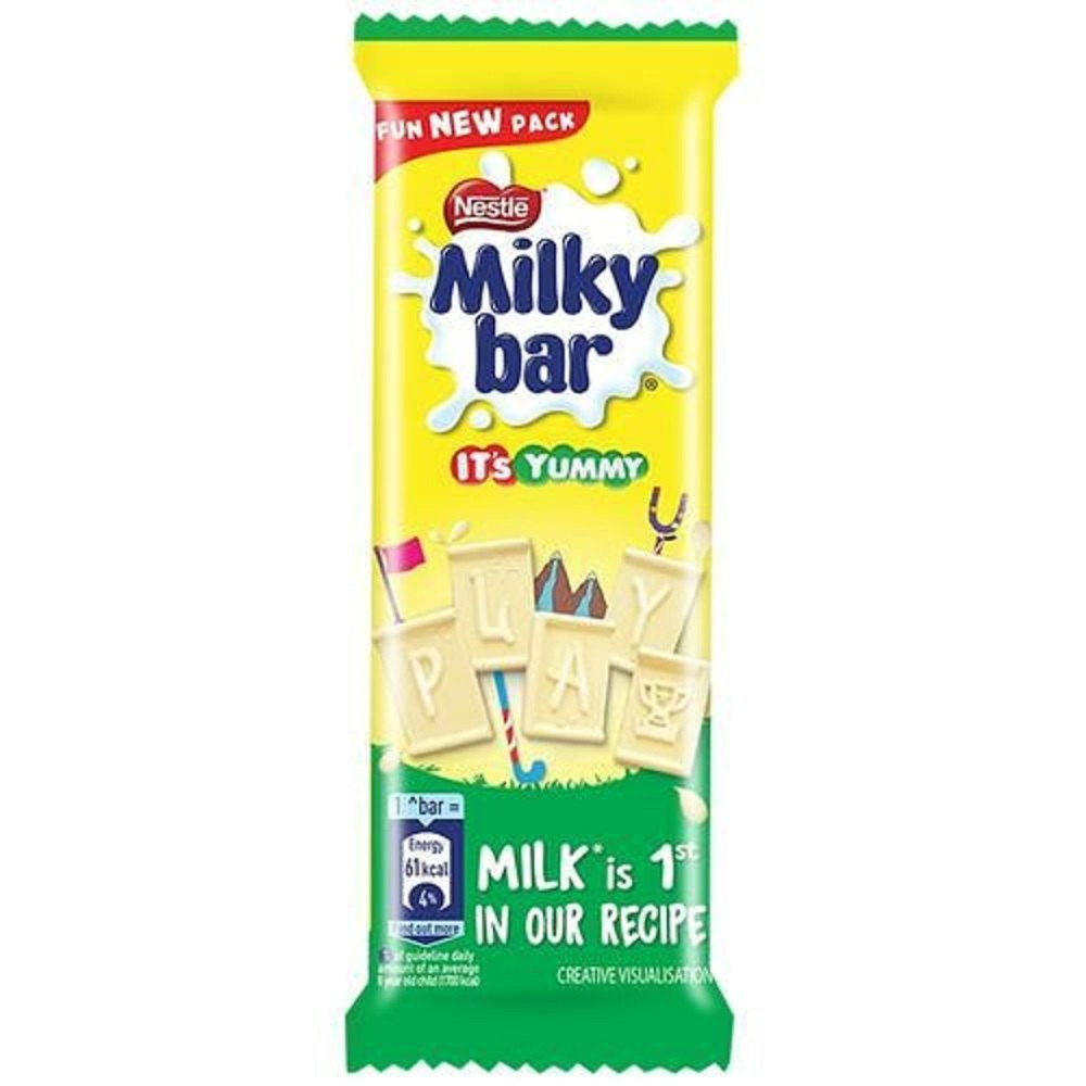 Таблетка Milkybar, приготовлена с молоком, вкусное и сливочное лакомство