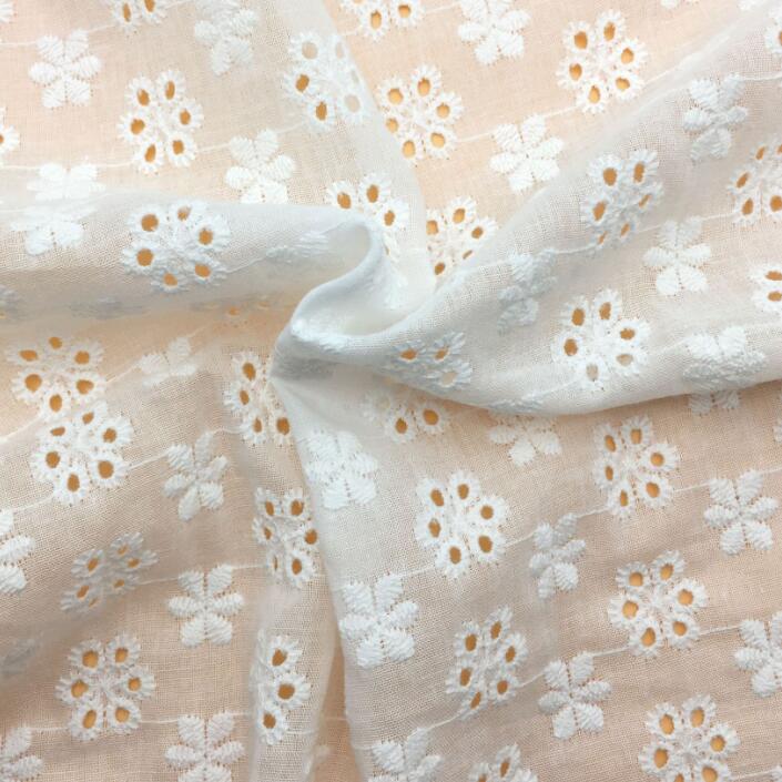 100% cotton embroidered cotton fabric for baby clothing schiffli lace hollow out fabric hot sale