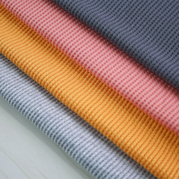 Solid color waffle knitted jacquard dyed 65 polyester 35 rayon fabric for garments