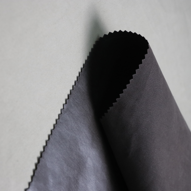 Soft breathable and moisture permeable waterproof ripstop release paper cotton nylon oxford fabric for jackets