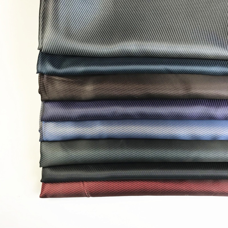 stocklot two tone satin dobby lining fabric cationic polyester small jacquard linings for suit