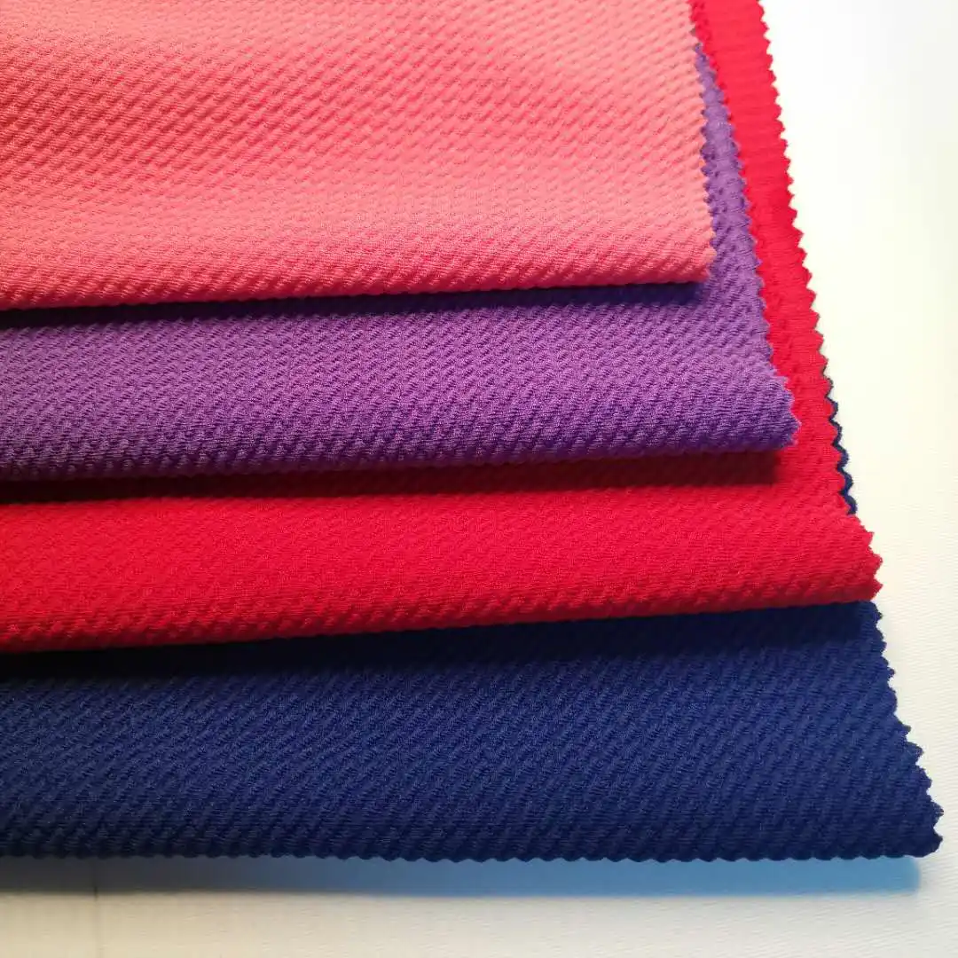Fabric Manufacturer Hot Sale Polyester Spandex Stretch Bubble Rice Bullet Knitted Jacquard Soild Fabric For Women Dress