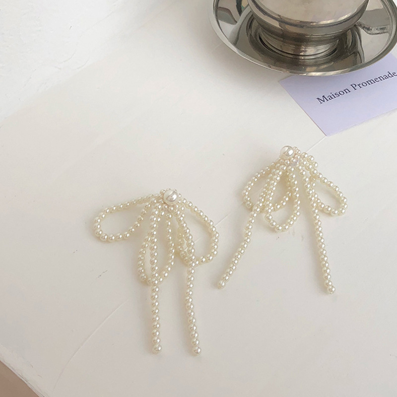 Jewelry 925 silver needle Korea East Gate pearl Bow Earrings tassel Fashion net red personalized