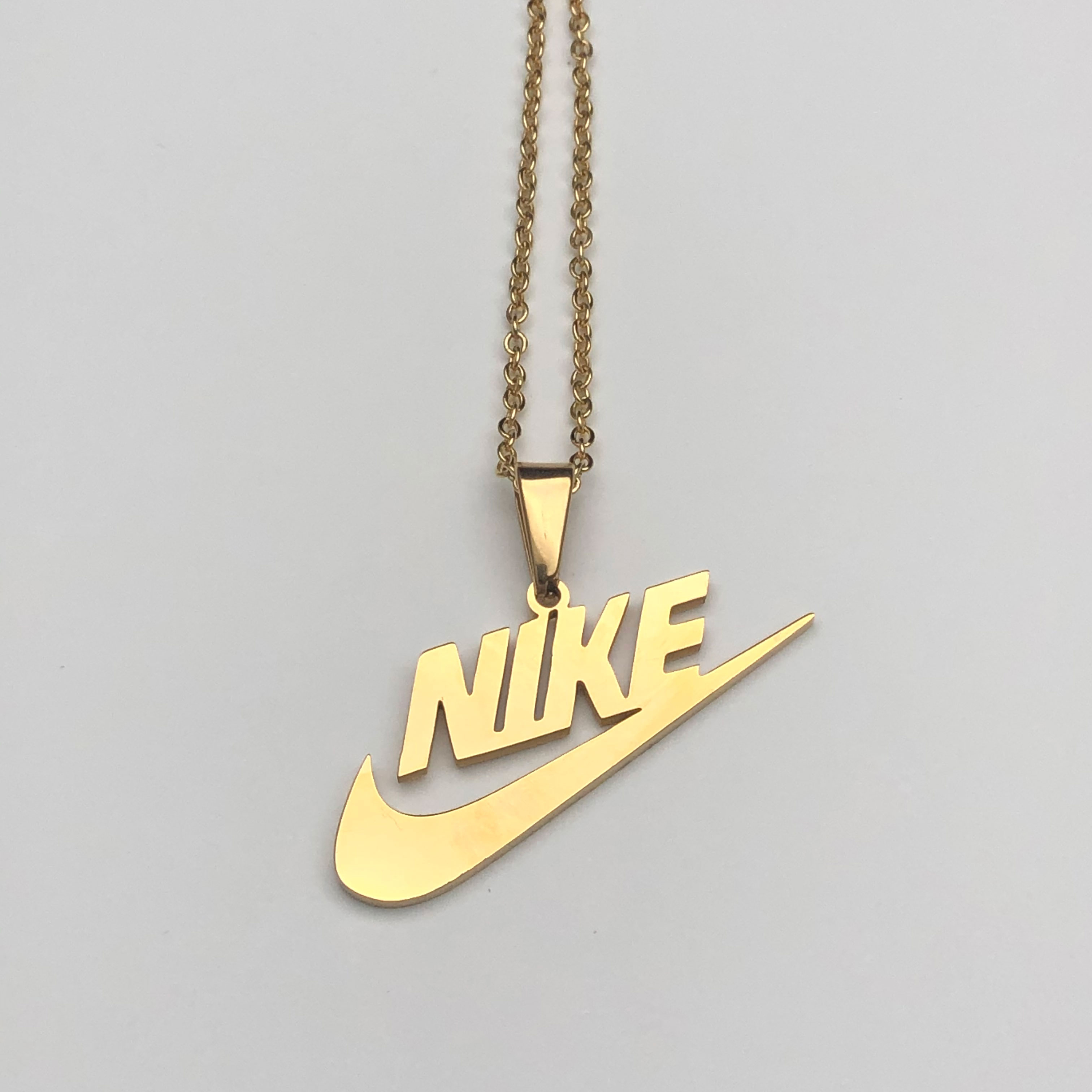 18K Золотые Swoosh цепи из нержавеющей стали Swoosh Подвески Колье в винтажном стиле с тик городской Jewelry тик для мужчин кулон рок логотипом цепи