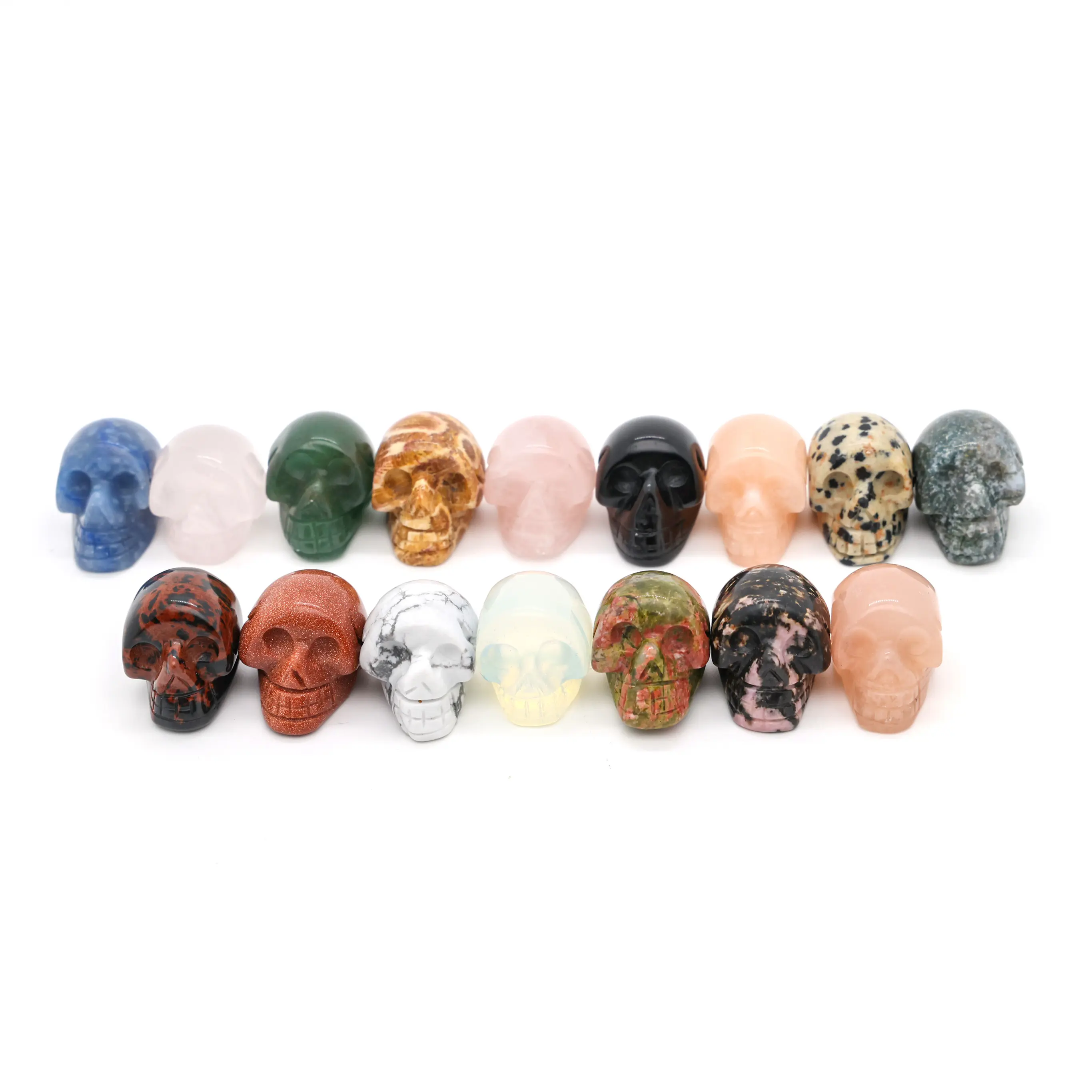 Natural crystal gem stone skulls craved pink quartz skulls small different materials quartz carved crystal skulls