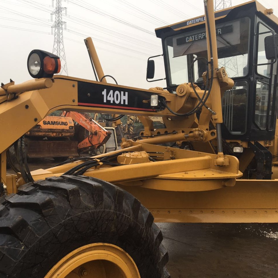 Автогрейдер Caterpillar140H, сделано в Японии