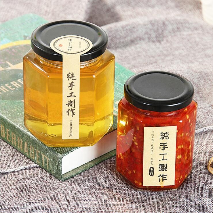 Wholesale Cheap Hexagon Food Storage Bottle Empty Honey Glass Jar for Canning with Metal Lid