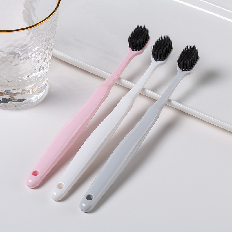 Bamboo charcoal adult toothbrush individual packaging can be customized OEM