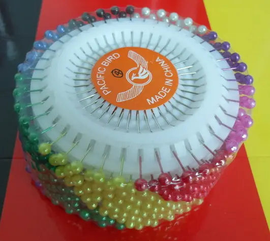 pearl head pins in plastic box packing