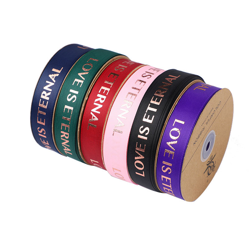 Wholesale custom 2.5cm*45m English bronzing luxury gift cake box packaging satin ribbon elastic printed polyester webbing