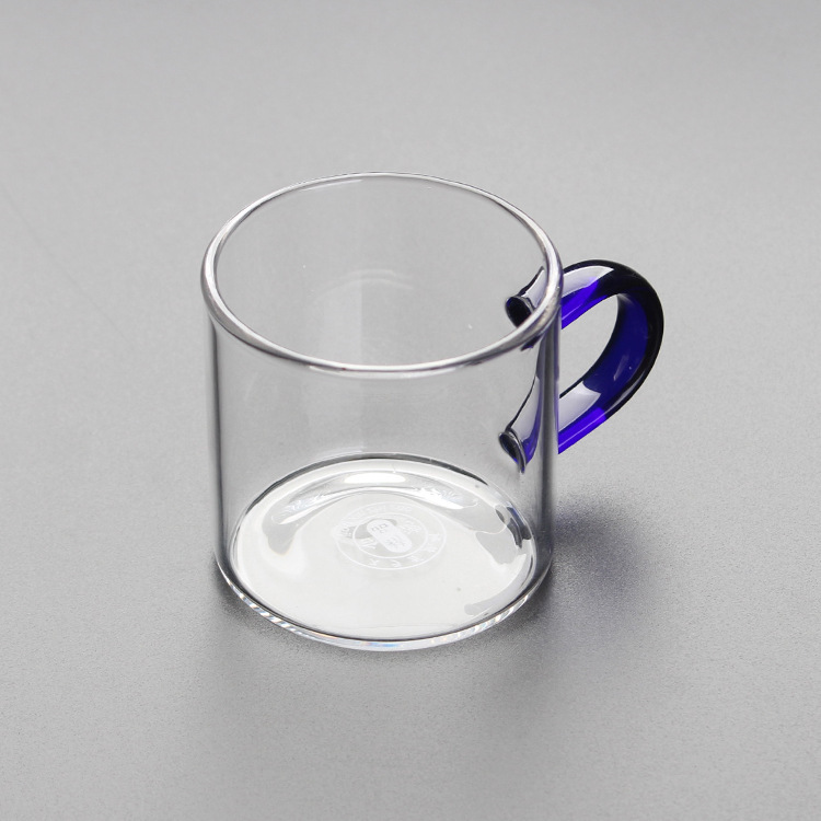 Round transparent straight cup with coloured handle