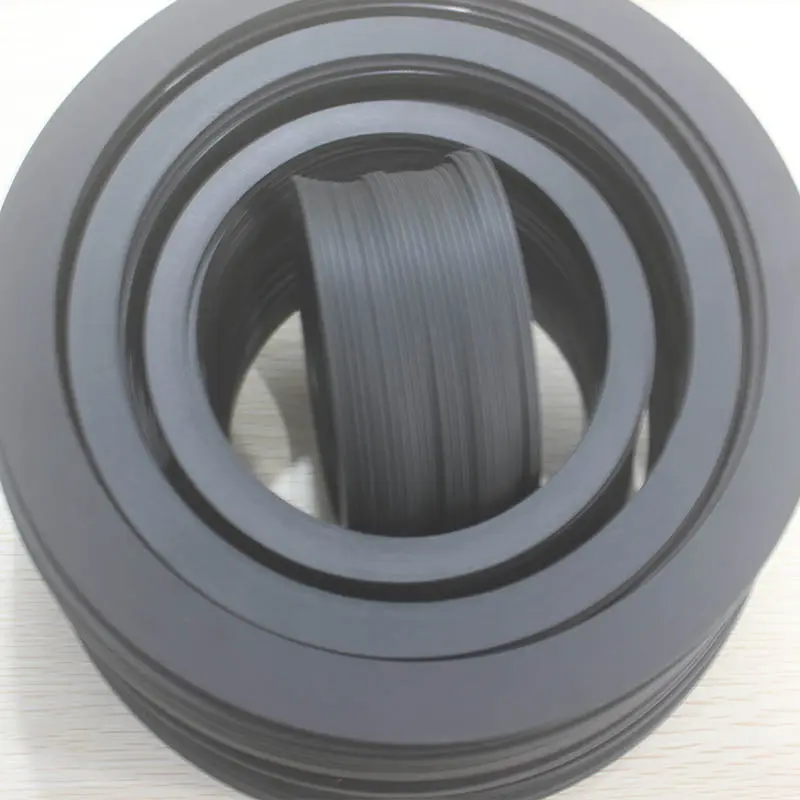 small thin red steel paper gasket ring and ptfe nylon plastic insulating washer