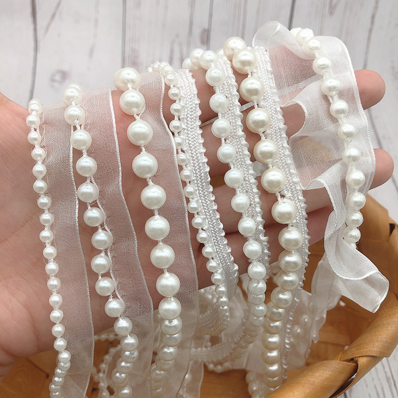 New design hand made pearl 3d beaded lace fabric for wedding dress embroidered flower pearl tulle embroidery lace