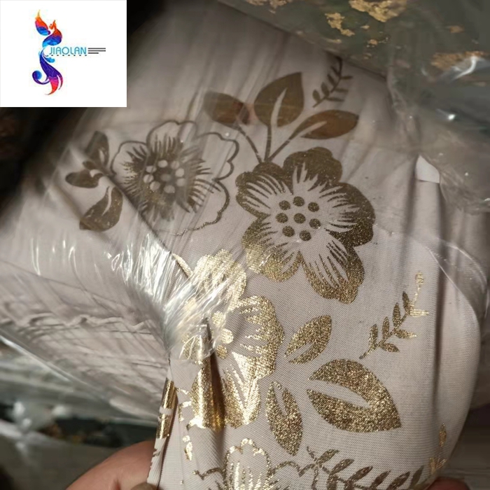 Hot-Sale cheap good quality knitted polyester stretch gold stocklot fabric for garments