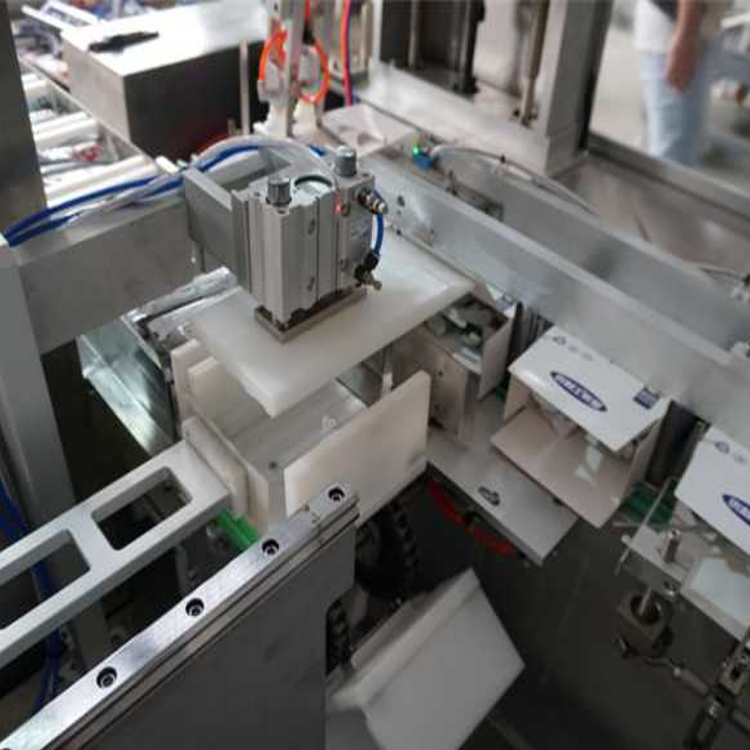 Food box erector with flap gluing