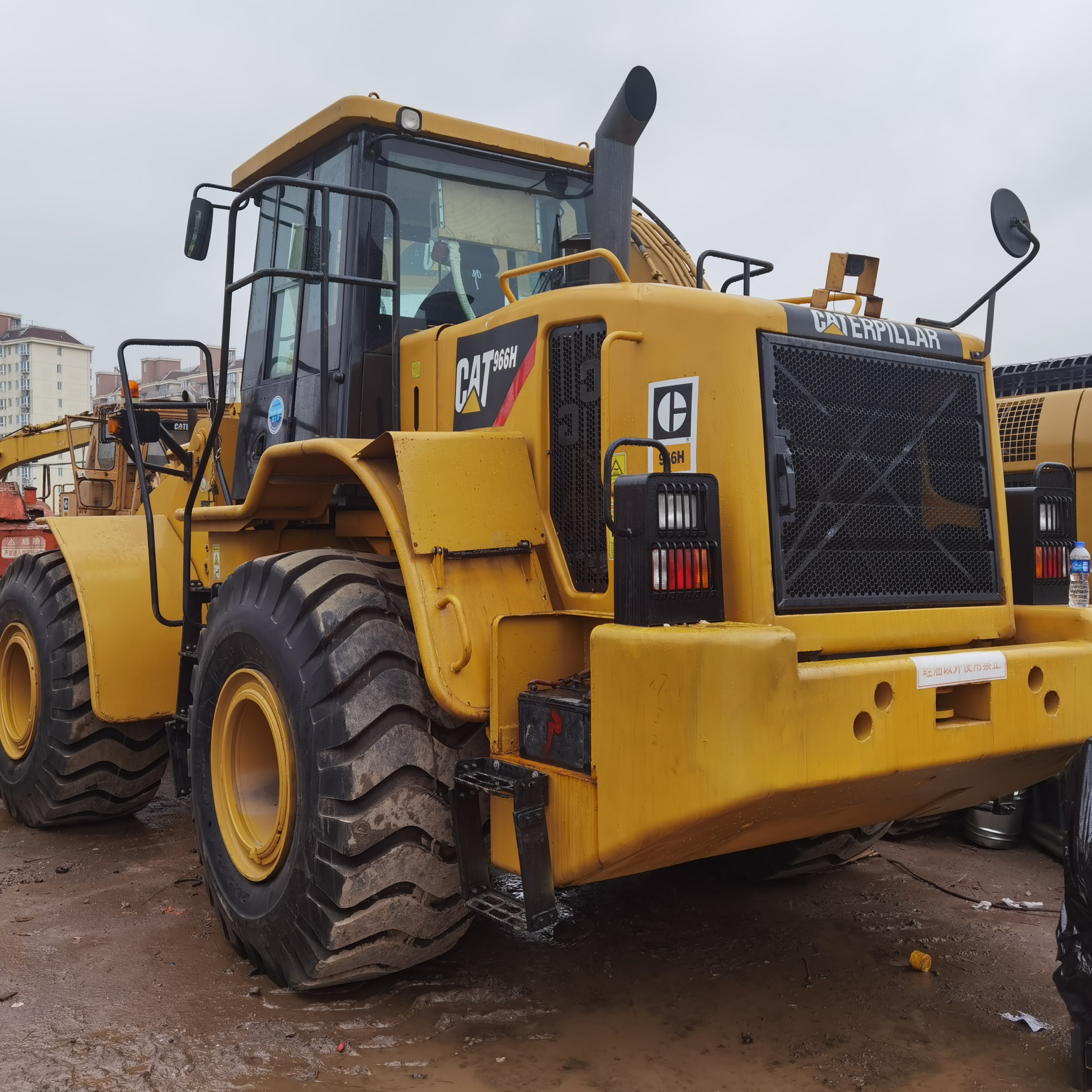 Подержанный погрузчик Cat 966h