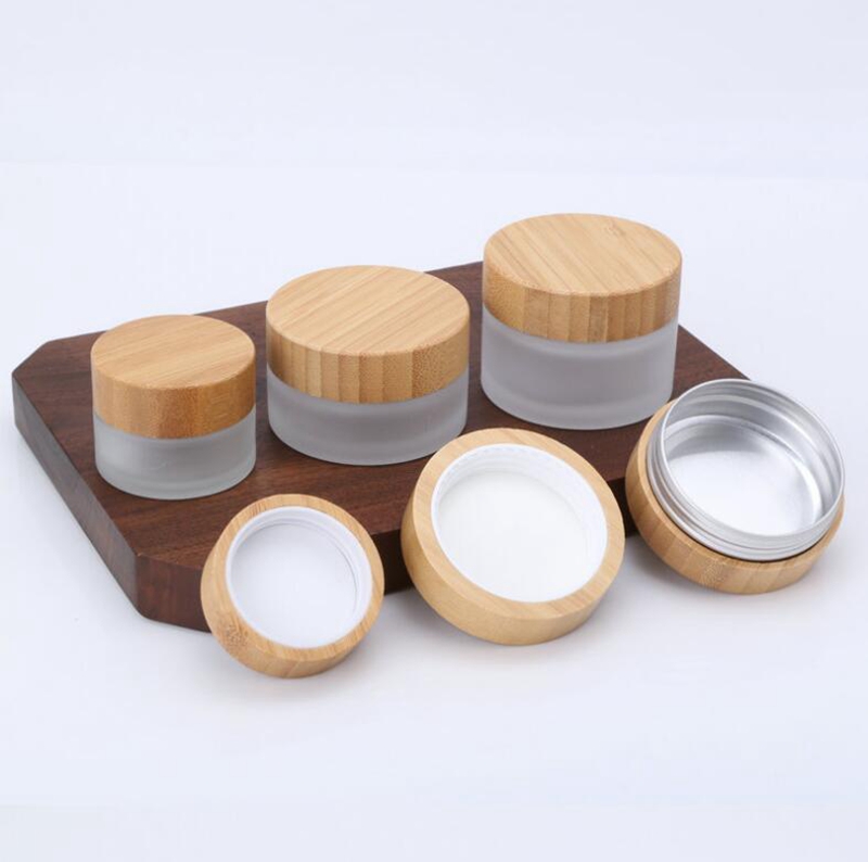 Hot Sale 50ml 60ml 90ml 100ml Cleat Frost Glass Jar with CRC Bamboo Cap for Face Cream